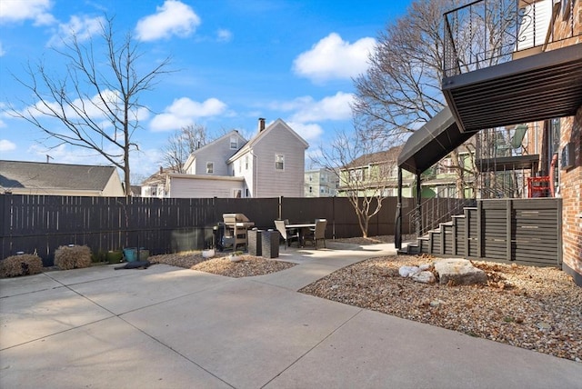 view of patio with a fenced backyard