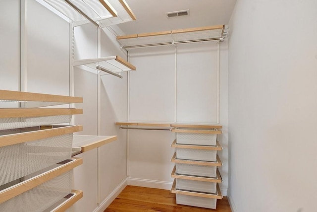 spacious closet with visible vents and light wood finished floors