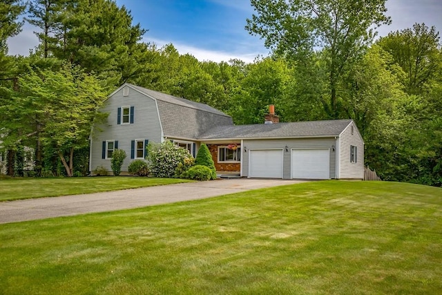 8 Evergreen Ter, Hampden, MA 01036 - colonial inspired home with an attached garage, driveway, a front yard, a gambrel roof, and a chimney