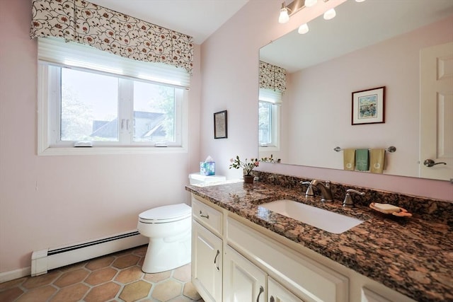 8 Fieldstone Ln, Natick, MA 01760 - bathroom with vanity, toilet, baseboards, tile patterned floors, and a baseboard radiator