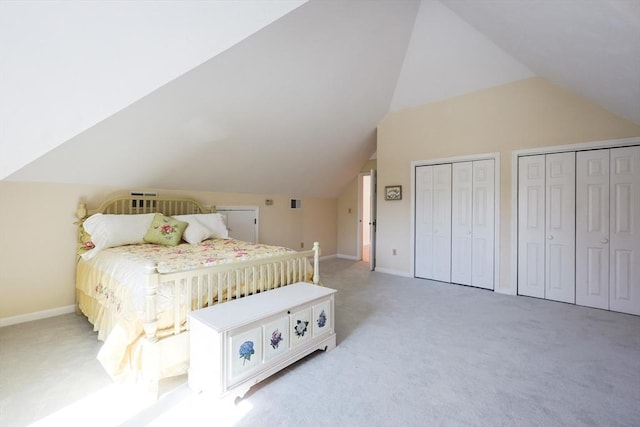 8 Fieldstone Ln, Natick, MA 01760 - carpeted bedroom featuring baseboards, two closets, and vaulted ceiling