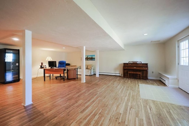 8 Fieldstone Ln, Natick, MA 01760 - office area with baseboards, baseboard heating, light wood finished floors, and a baseboard radiator