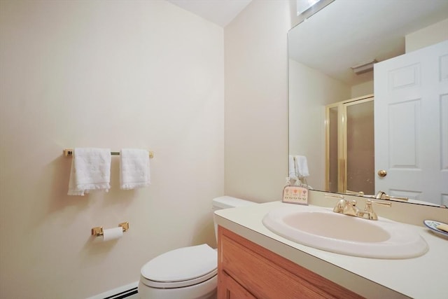 8 Fieldstone Ln, Natick, MA 01760 - bathroom with vanity, a baseboard radiator, a shower stall, and toilet