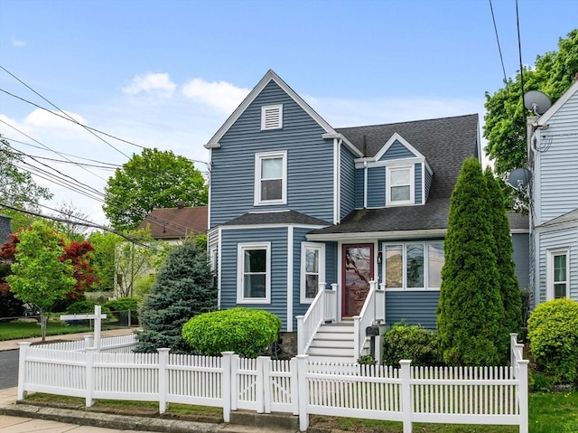 28 Albano St, Boston, MA 02131 - view of front facade with roof with shingles and a fenced front yard