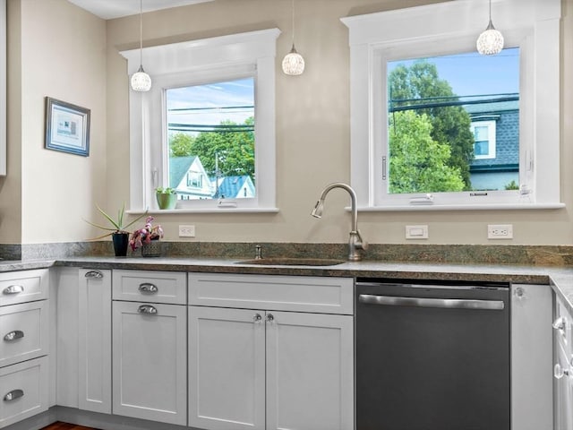 28 Albano St, Boston, MA 02131 - kitchen with stainless steel dishwasher, healthy amount of natural light, a sink, and hanging light fixtures