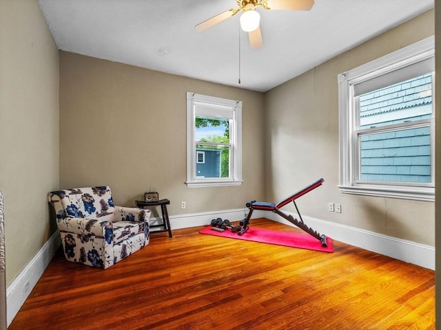 28 Albano St, Boston, MA 02131 - workout area featuring wood finished floors, ceiling fan, and baseboards