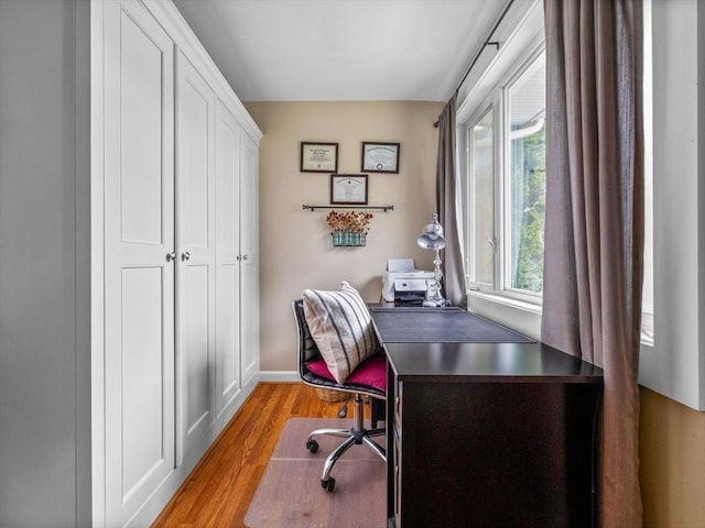 28 Albano St, Boston, MA 02131 - office area featuring light wood-style flooring, healthy amount of natural light, and baseboards