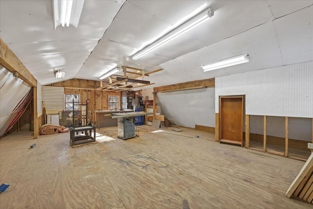 basement with a workshop area