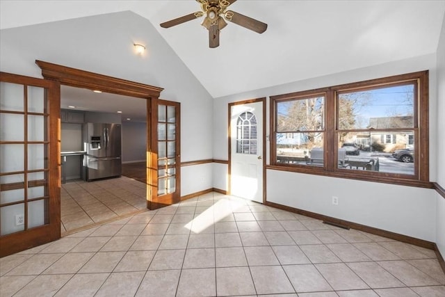 interior space with high vaulted ceiling, french doors, and ceiling fan