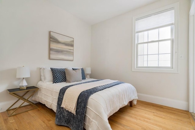 bedroom featuring hardwood / wood-style flooring