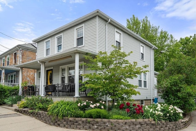 41 Bancroft St, Watertown, MA 02472 - view of side of home featuring covered porch