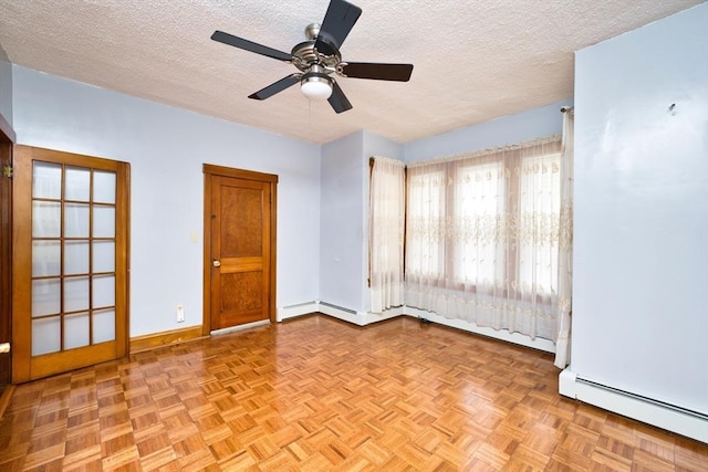 101 Cory St, Fall River, MA 02720 - empty room with a textured ceiling, baseboard heating, baseboards, and ceiling fan