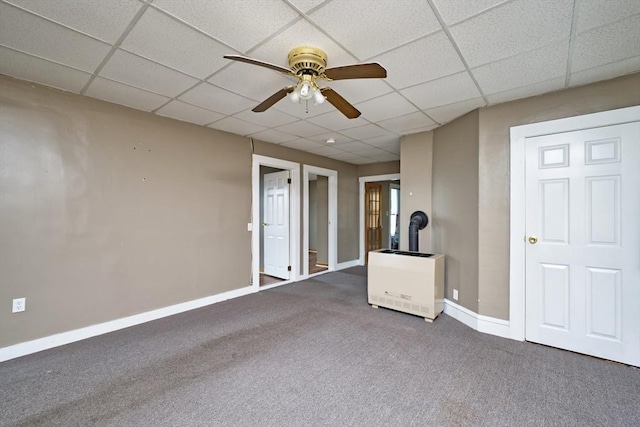 101 Cory St, Fall River, MA 02720 - empty room featuring ceiling fan, a paneled ceiling, carpet floors, baseboards, and heating unit