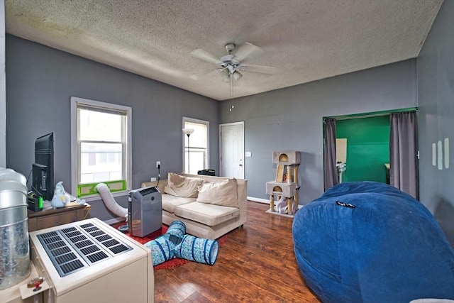 101 Cory St, Fall River, MA 02720 - living room with wood finished floors, ceiling fan, and a textured ceiling