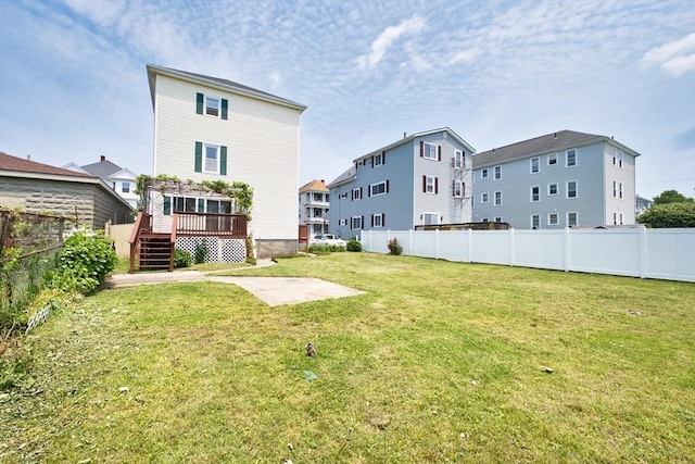 101 Cory St, Fall River, MA 02720 - view of yard featuring a wooden deck, stairway, and a patio area