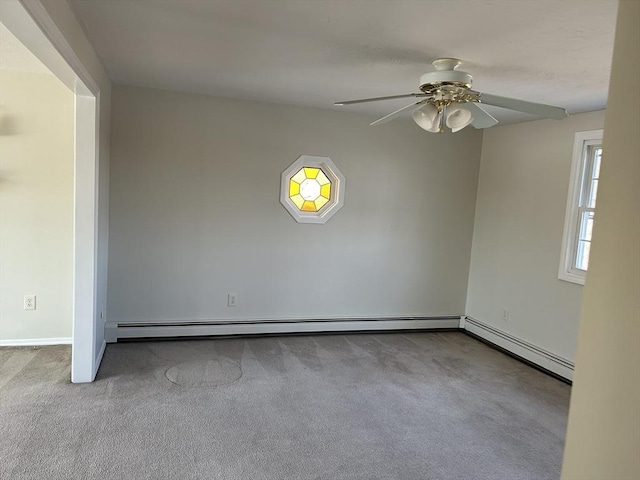 empty room featuring ceiling fan, baseboard heating, and carpet flooring