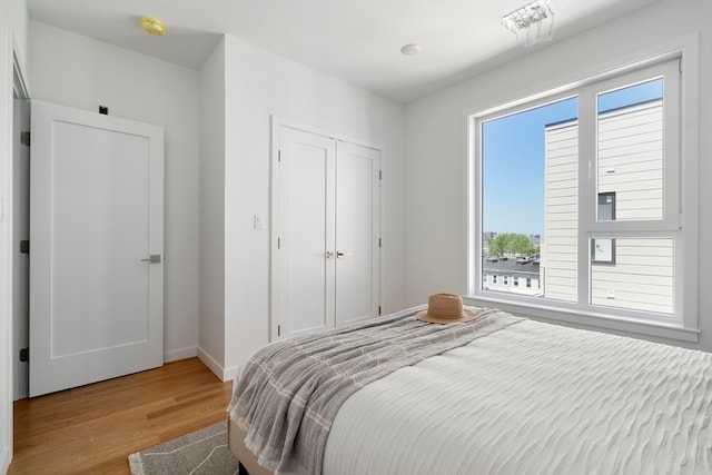 bedroom featuring light wood-type flooring