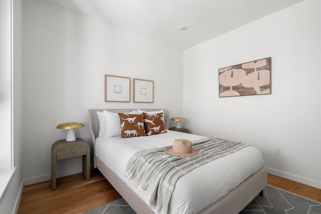 bedroom featuring hardwood / wood-style floors