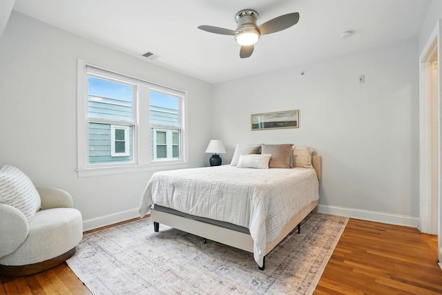 33 Century St Unit 3, Somerville, MA 02145 - bedroom with wood finished floors and a ceiling fan