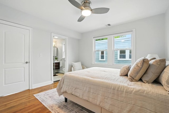 33 Century St Unit 3, Somerville, MA 02145 - bedroom with wood finished floors, a ceiling fan, and connected bathroom