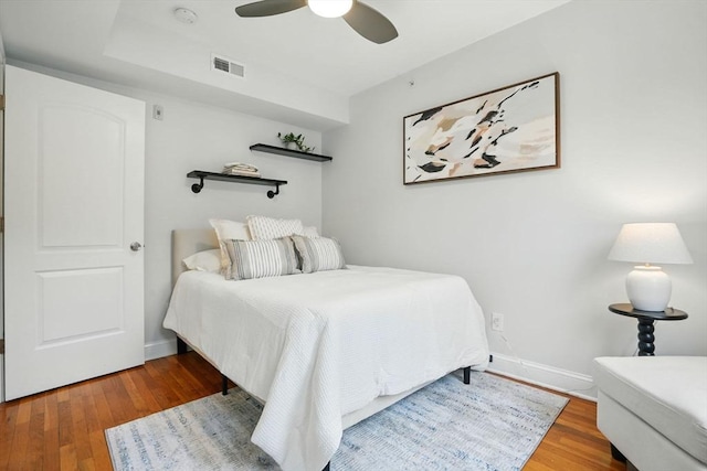 33 Century St Unit 3, Somerville, MA 02145 - bedroom with wood finished floors and a ceiling fan
