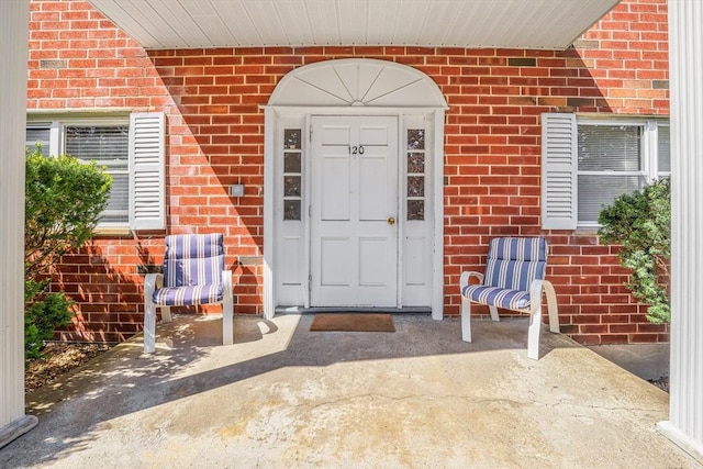 120 Litchfield Pines Dr Unit A, Leominster, MA 01453 - doorway to property featuring brick siding