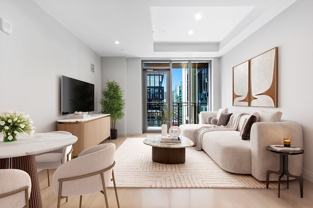 living room with light hardwood / wood-style flooring