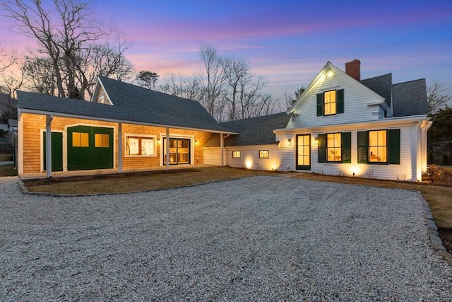 540 S Orleans, Orleans, MA 02653 - back of property with a chimney, driveway, and roof with shingles