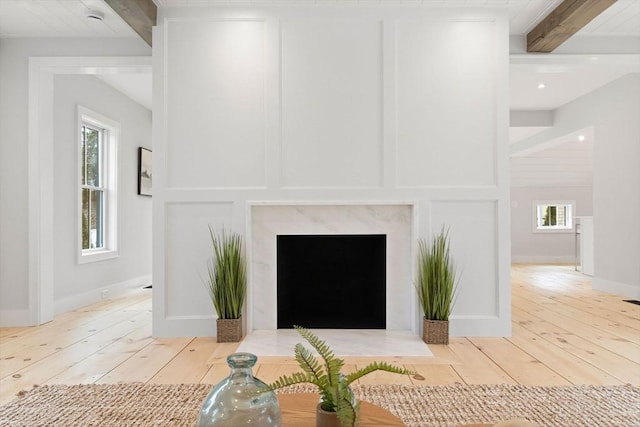 540 S Orleans, Orleans, MA 02653 - detailed view of beam ceiling, wood finished floors, a premium fireplace, and recessed lighting