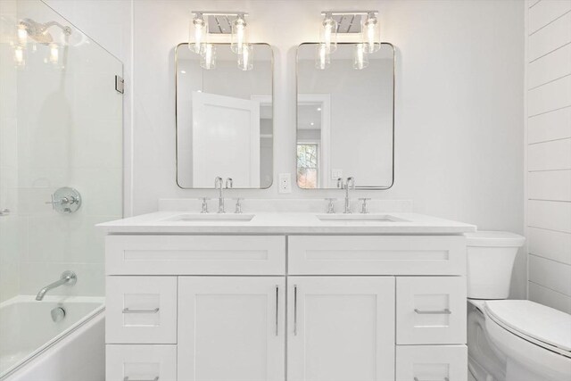 540 S Orleans, Orleans, MA 02653 - full bathroom featuring double vanity, toilet, and washtub / shower combination