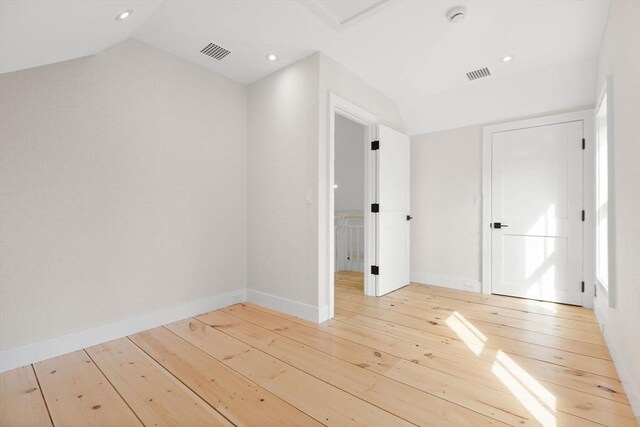 540 S Orleans, Orleans, MA 02653 - bonus room with light wood-type flooring, lofted ceiling, baseboards, and recessed lighting