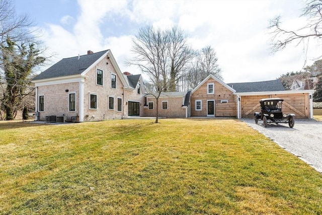 540 S Orleans, Orleans, MA 02653 - back of property featuring a lawn and central AC unit