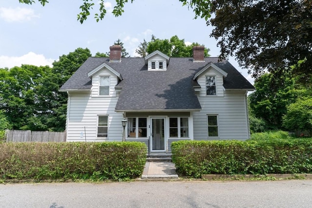 1 Commonwealth Ave, Sturbridge, MA 01518 - new england style home featuring a chimney and roof with shingles
