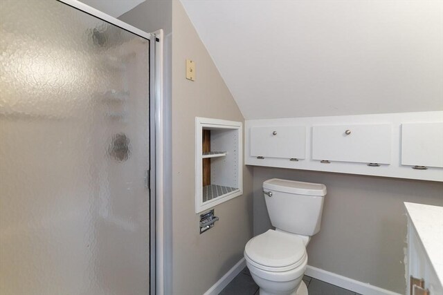 1 Commonwealth Ave, Sturbridge, MA 01518 - full bath with a shower stall, vaulted ceiling, vanity, and tile patterned flooring