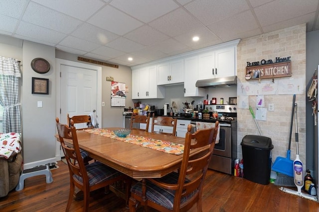 1 Commonwealth Ave, Sturbridge, MA 01518 - dining room featuring dark wood-style flooring, a paneled ceiling, and recessed lighting