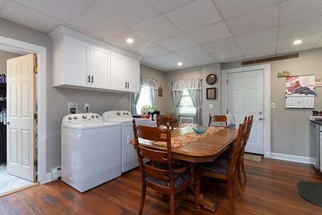1 Commonwealth Ave, Sturbridge, MA 01518 - dining space featuring washing machine and dryer, a baseboard heating unit, dark wood-style floors, a paneled ceiling, and recessed lighting