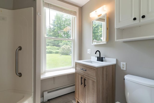 1 Commonwealth Ave, Sturbridge, MA 01518 - full bathroom with a baseboard heating unit, vanity,  shower combination, and tile patterned flooring