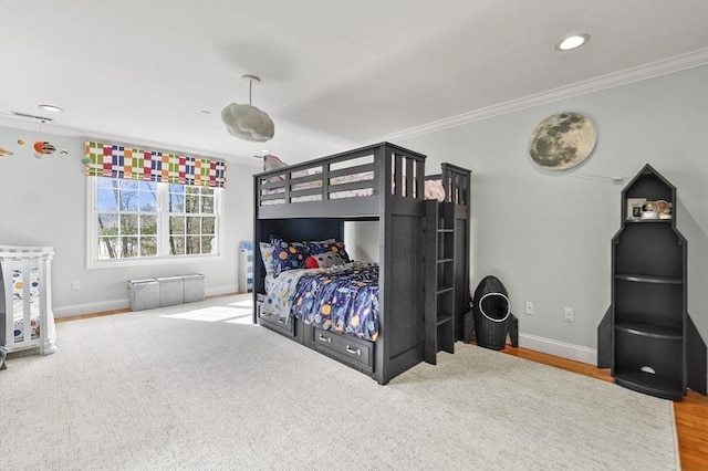 bedroom featuring baseboards, recessed lighting, and crown molding