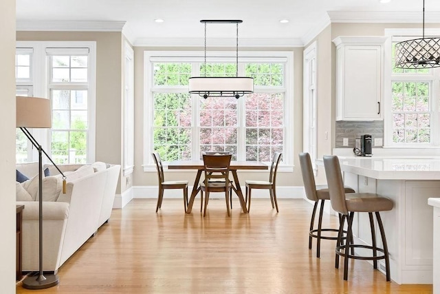 16 Grace Rd, Newton, MA 02459 - dining space with light wood-style flooring, baseboards, ornamental molding, and recessed lighting