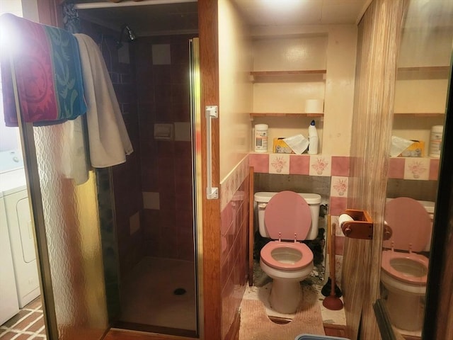 190 Ennell St, Lowell, MA 01850 - full bathroom with toilet, a shower stall, tile walls, washer / clothes dryer, and wainscoting