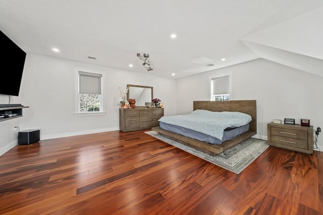 bedroom with visible vents, recessed lighting, baseboards, and wood finished floors