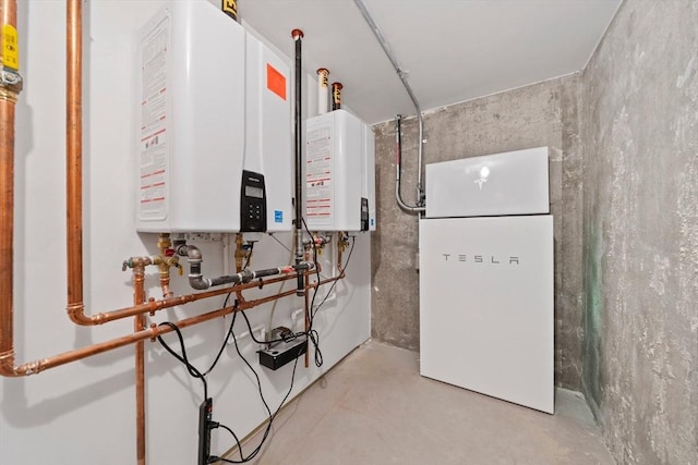 utility room featuring water heater