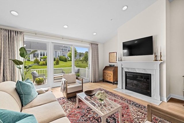 5 Diane Ter Unit 5, Scituate, MA 02066 - living room with a high end fireplace, lofted ceiling, recessed lighting, and wood finished floors