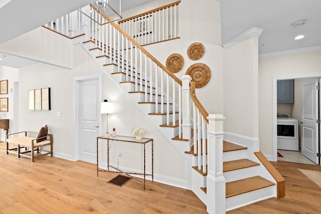 5 Diane Ter Unit 5, Scituate, MA 02066 - staircase featuring washer / clothes dryer, wood finished floors, crown molding, and recessed lighting