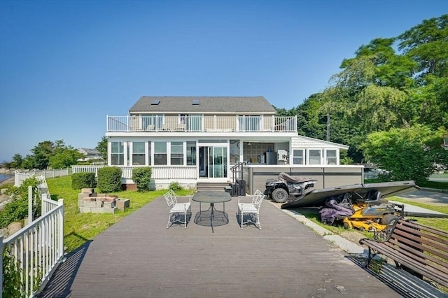 104 Kings Cove Beach Rd, Weymouth, MA 02191 - rear view of property featuring a balcony