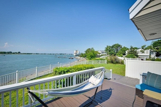 104 Kings Cove Beach Rd, Weymouth, MA 02191 - wooden terrace featuring a water view and a fenced backyard