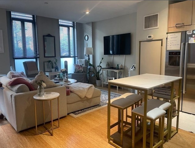 691 Massachusetts Ave Unit 102, Boston, MA 02118 - living room with light wood-style floors and recessed lighting