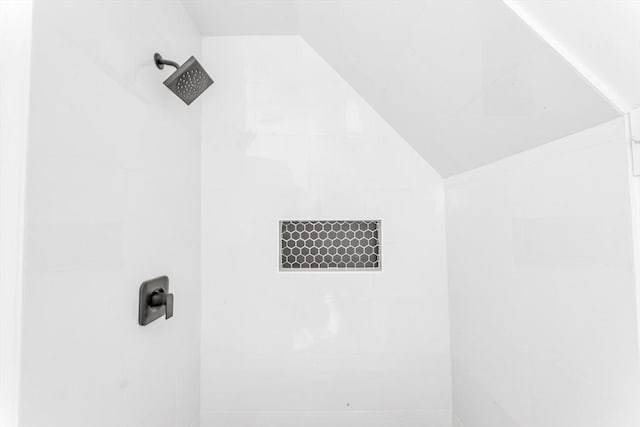 bathroom view of tiled shower