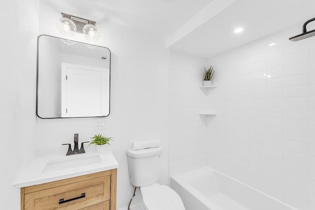 bathroom featuring vanity, toilet, and shower / bathtub combination