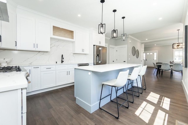 kitchen with recessed lighting, high end refrigerator, decorative backsplash, and dark wood-style flooring